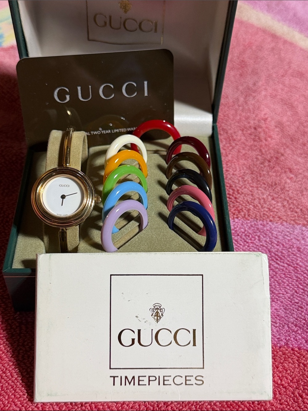 Gucci Gold Bangle Watch with Multi-Color Interchangeable Bezels